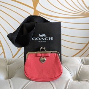 Coach coin purse in pink patent leather
